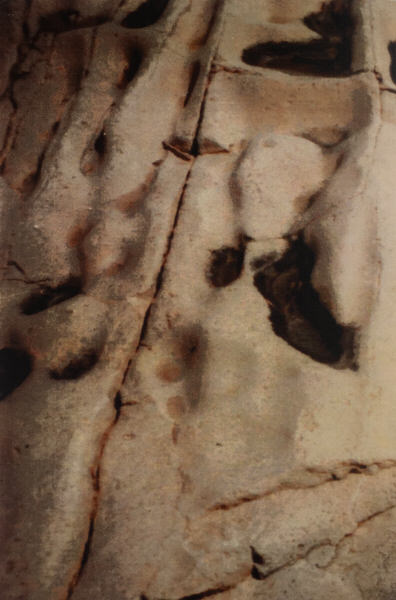 Detail van een door water geërodeerde rots.